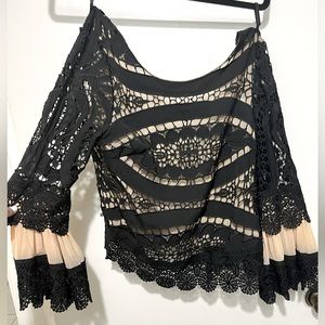 Beautiful Venus brand evening shirt with backless tied lace and ribbon!Size six